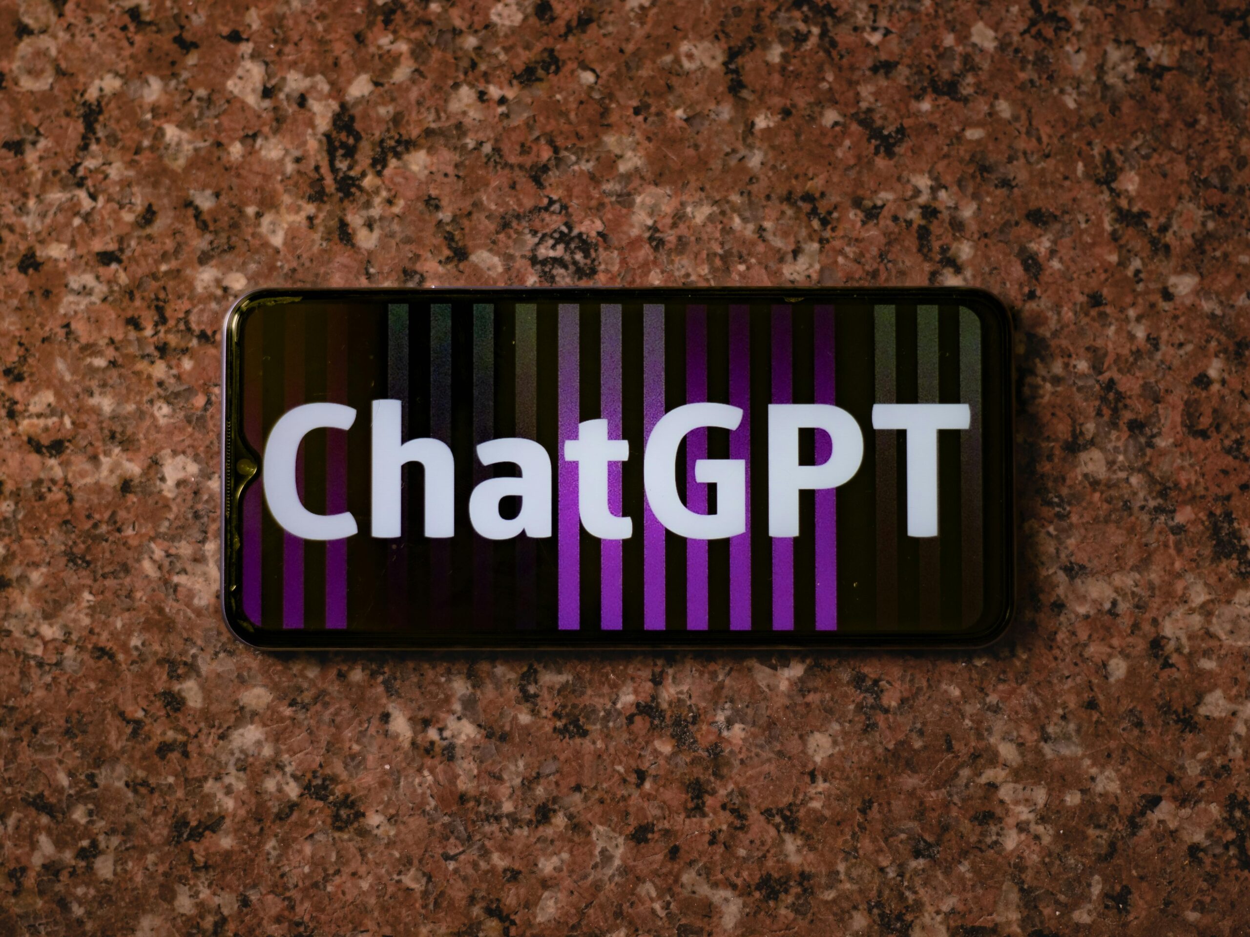 A smartphone displaying the ChatGPT webpage