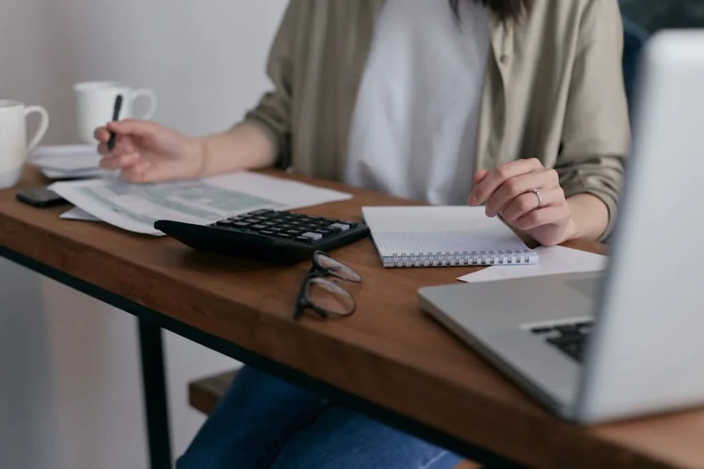 A woman doing some accounting tasks